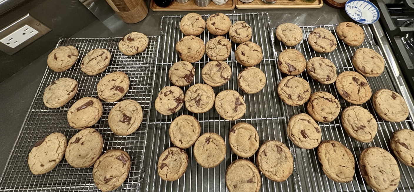 Chocolate-chip cookies cooling on wire racks